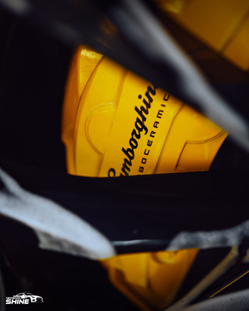 2021 Lamborghini Urus Auto Detailing and Ceramic Coating - Driver Caliper Foamy Close