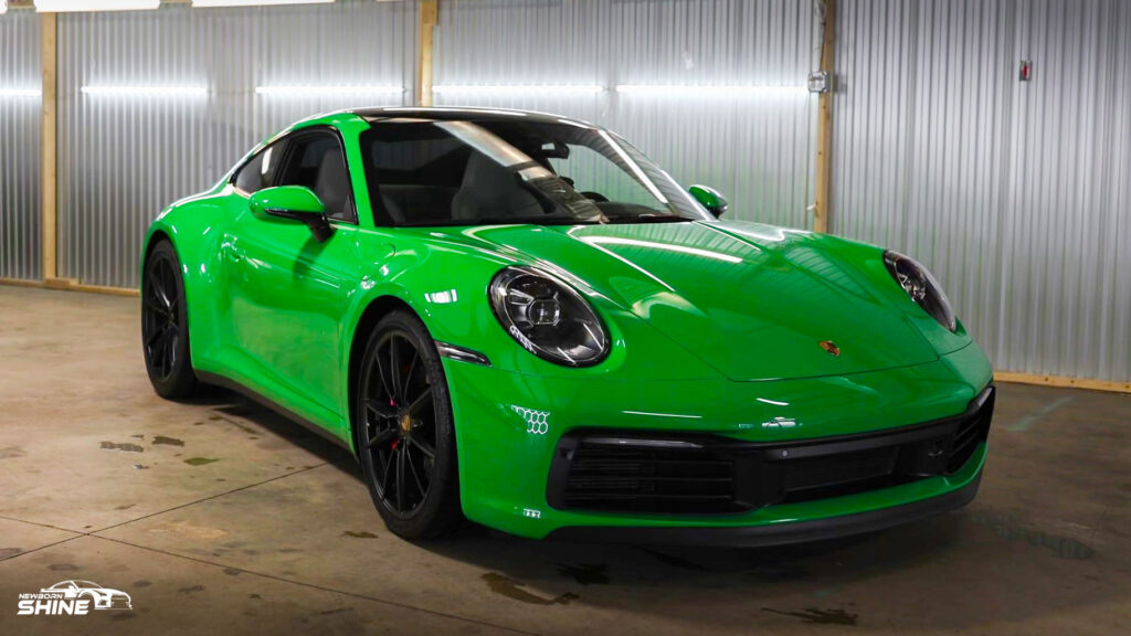 2022 Green Porsche 911 Auto Detailing and Ceramic Coating - Passenger Front Half in shop
